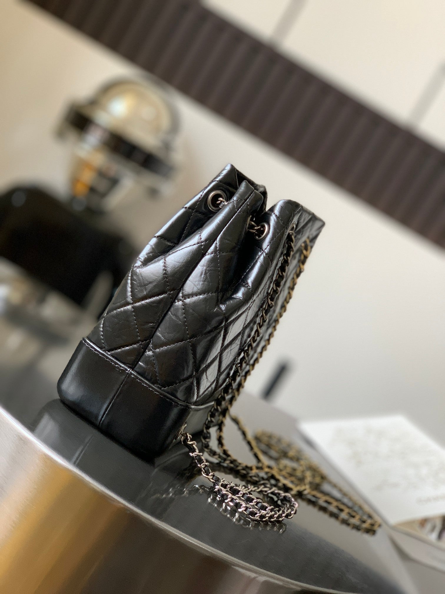 CHANEL 25S GRABRIELLE BACKPACK 24 CM IN BLACK LAMBSKIN