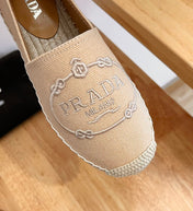 PRADA 26S EMBROIDERED LOGO ESPADRILLE FLATS IN BEIGE CANVAS