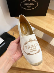 PRADA 26S EMBROIDERED LOGO ESPADRILLE FLATS IN IVORY WHITE CANVAS