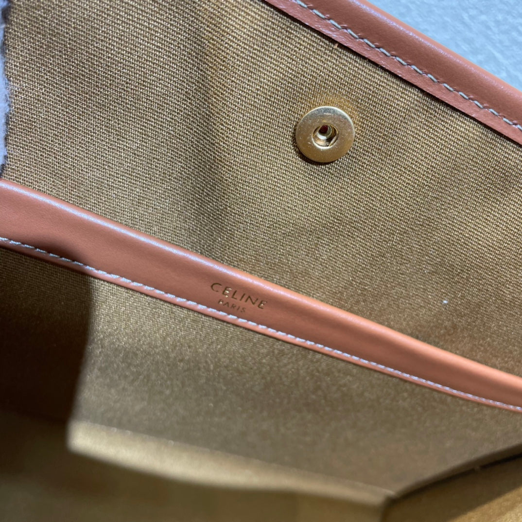 CELINE 25S HORIZONTAL CABAS 34MM IN BLACK TRIOMPHE CANVAS AND BROWN CALFSKIN