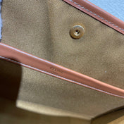 CELINE 25S HORIZONTAL CABAS 34MM IN BLACK TRIOMPHE CANVAS AND BROWN CALFSKIN