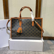 CELINE 25S HORIZONTAL CABAS 34MM IN BLACK TRIOMPHE CANVAS AND BROWN CALFSKIN