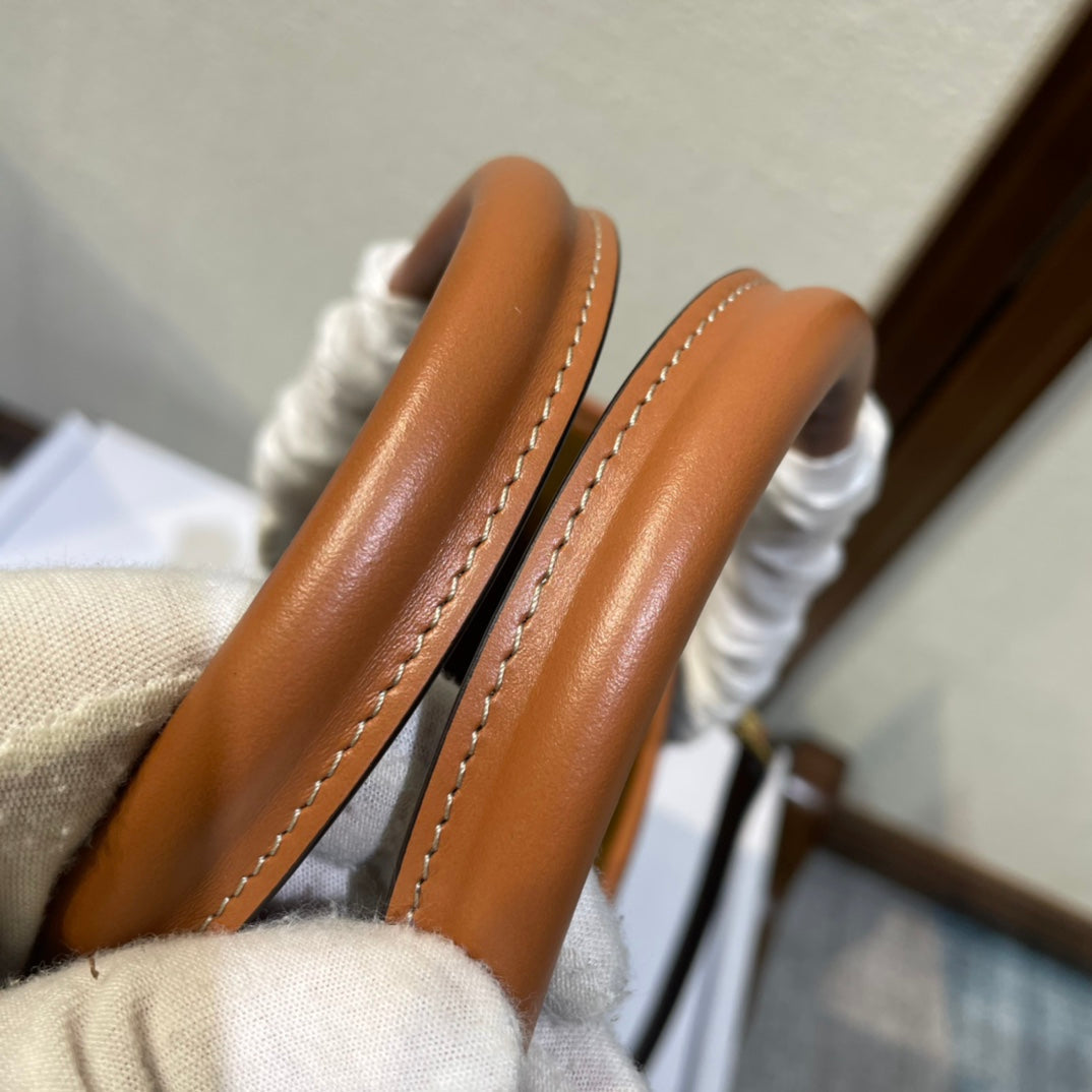 CELINE 25S HORIZONTAL CABAS 34MM IN BLACK TRIOMPHE CANVAS AND BROWN CALFSKIN