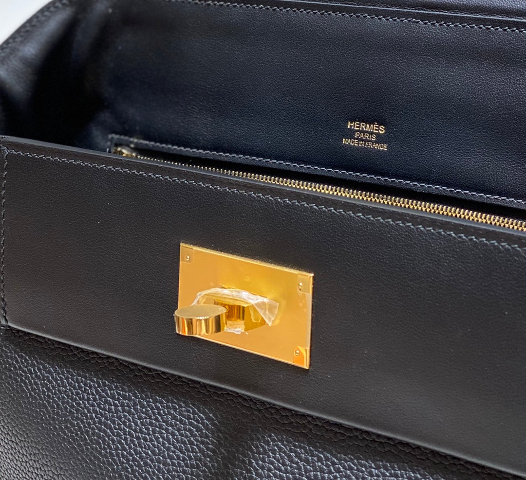 MINI 24/24 29CM IN BLACK EVERCOLOR CALFSKIN GOLD KELLY BUCKLE