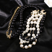 CHANEL 25S CHAIN BELT IN WHITE AND BLACK PEARL 614477