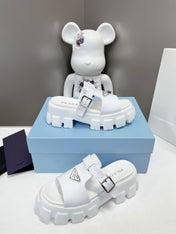 MONOLITH SLIPPER SANDALS IN WHITE RUBBER