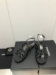 FLORAL FLAT SANDAL IN BLACK LAMBSKIN