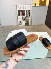 CHLOÉ WOODY MULE IN BLACK LAMBSKIN WITH EMBROIDERED LOGO