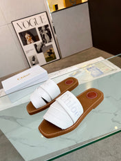 CHLOÉ WOODY MULE IN WHITE LAMBSKIN WITH EMBROIDERED LOGO