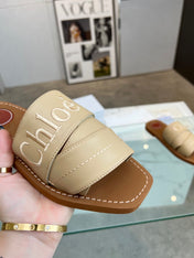 WOODY MULE IN TUSCAN BEIGE LAMBSKIN WITH EMBROIDERED LOGO