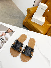TRIOMPHE SLIDE IN BLACK CALFSKIN