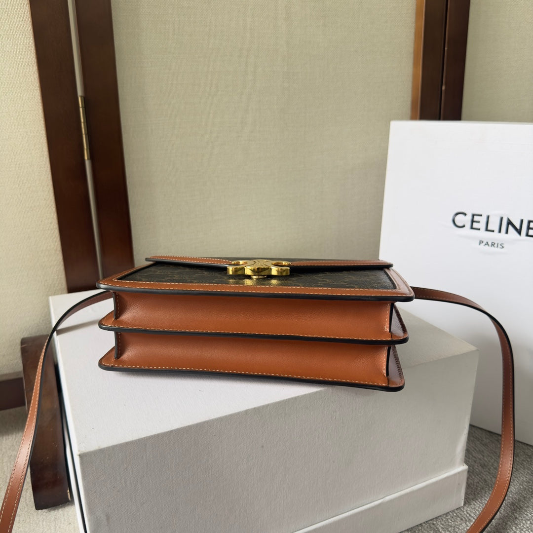 CELINE 25S WALLET MARGO 22MM IN BLACK TRIOMPHE CANVAS AND BROWN CALFSKIN