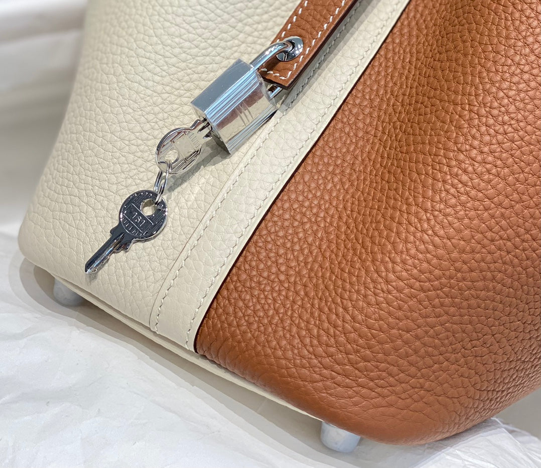HERMES 25S PICOTIN LOCK 18 IN WHITE AND BROWN CALFSKIN SILVER HARDWARE