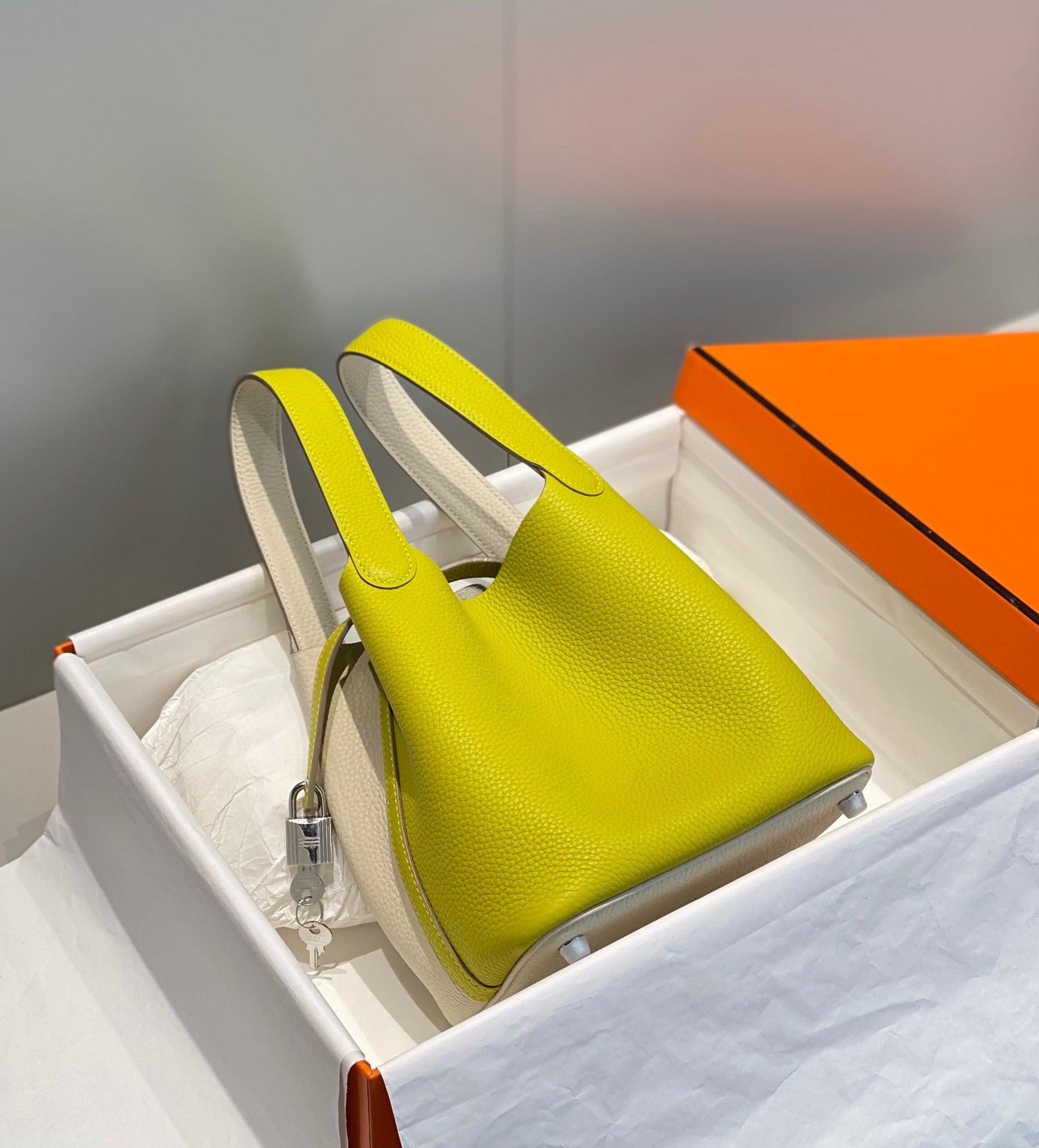 HERMES 25S PICOTIN LOCK 18 IN WHITE AND LEMON YELLOW CALFSKIN SILVER HARDWARE