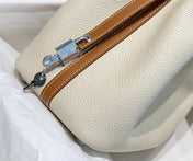 HERMES 25S PICOTIN LOCK 18 IN BURNT ORANGE AND IVORY CALFSKIN SILVER HARDWARE