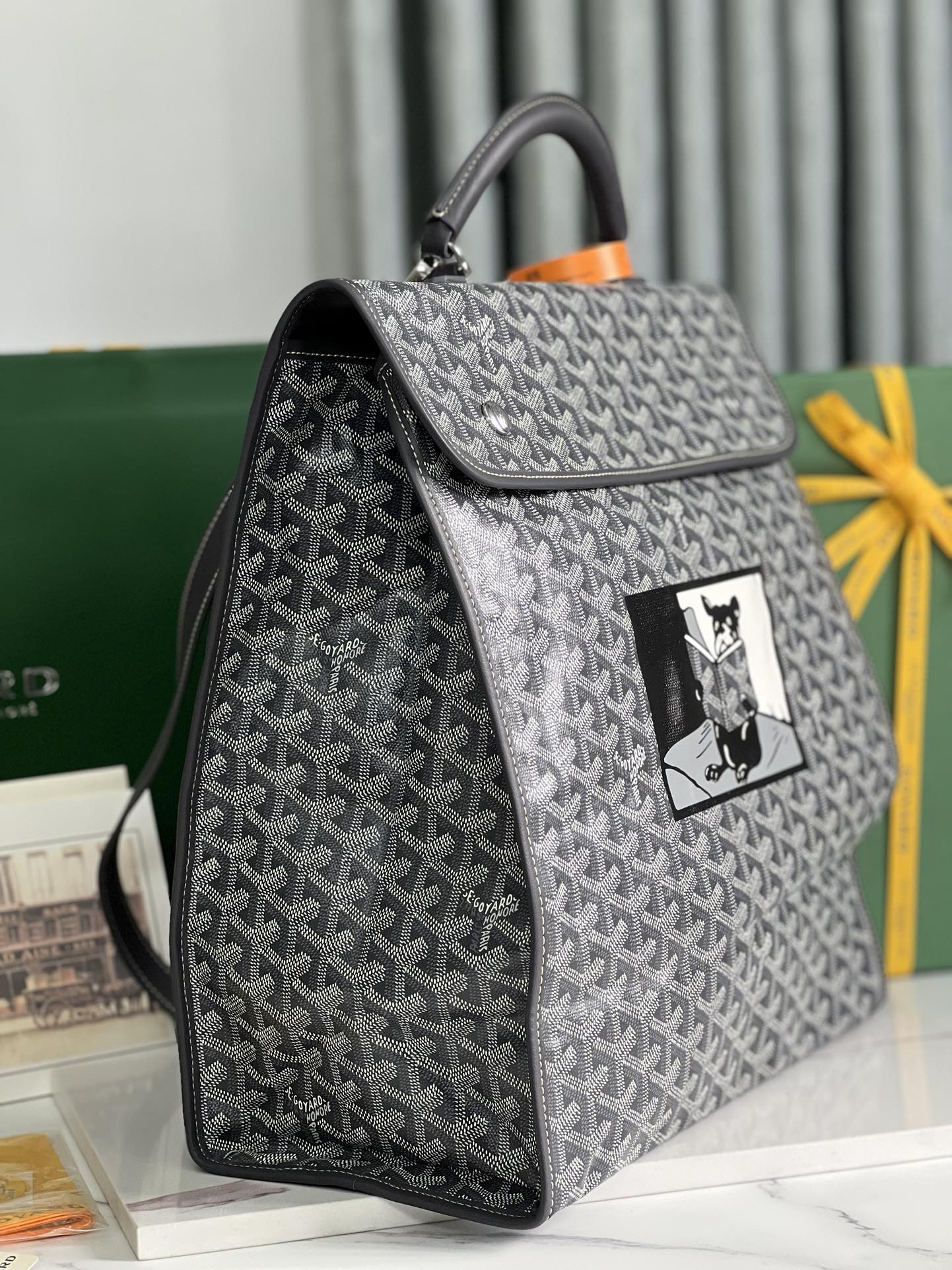 SAINT LÉGER BACKPACK 35 IN BLACK GOYARDINE CANVAS AND CALFSKIN WITH CARTOON PATCH