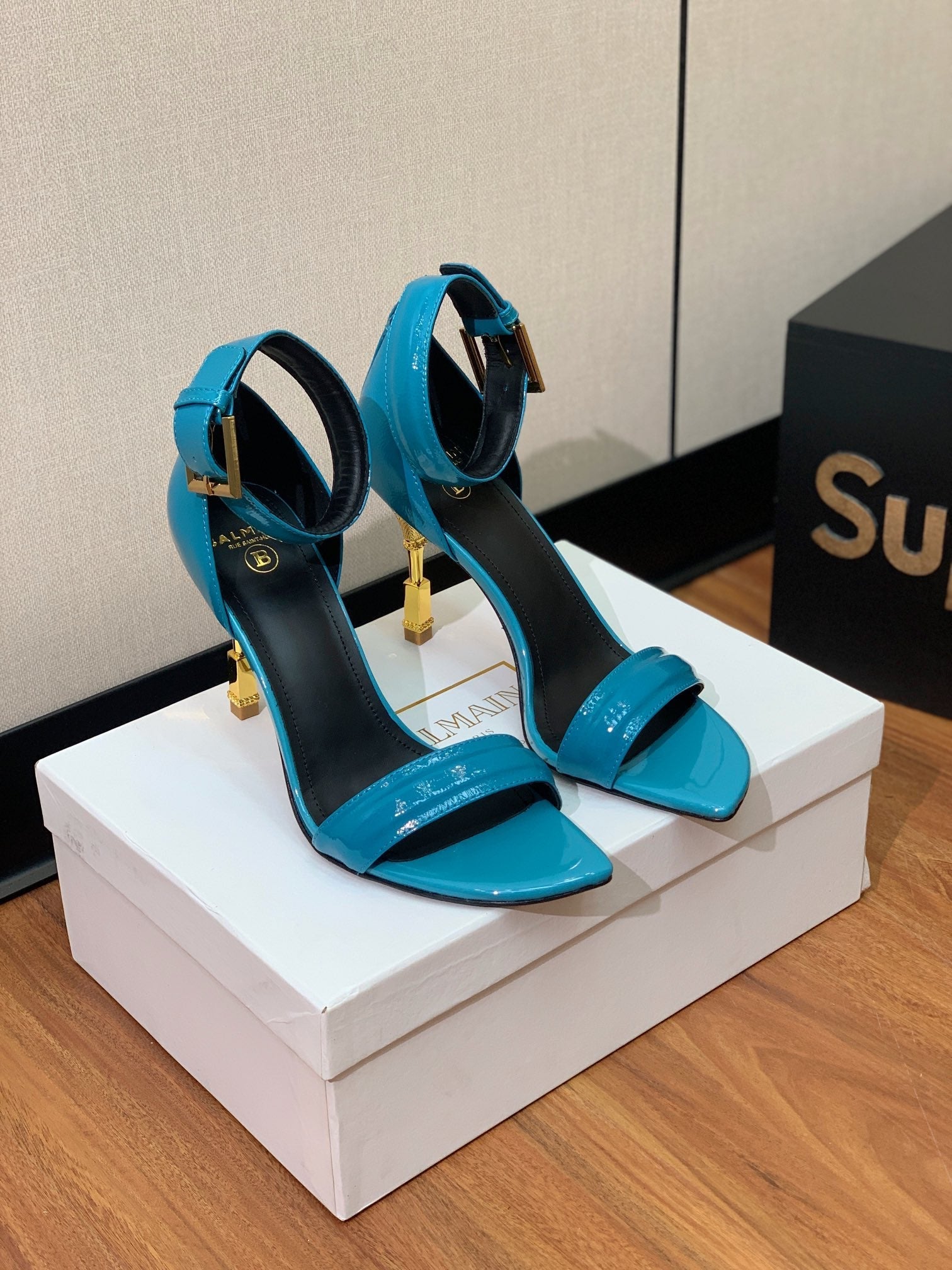 BALMAIN 26S METAL-HEEL SANDALS 105 MM IN CERULEAN BLUE CALFSKIN