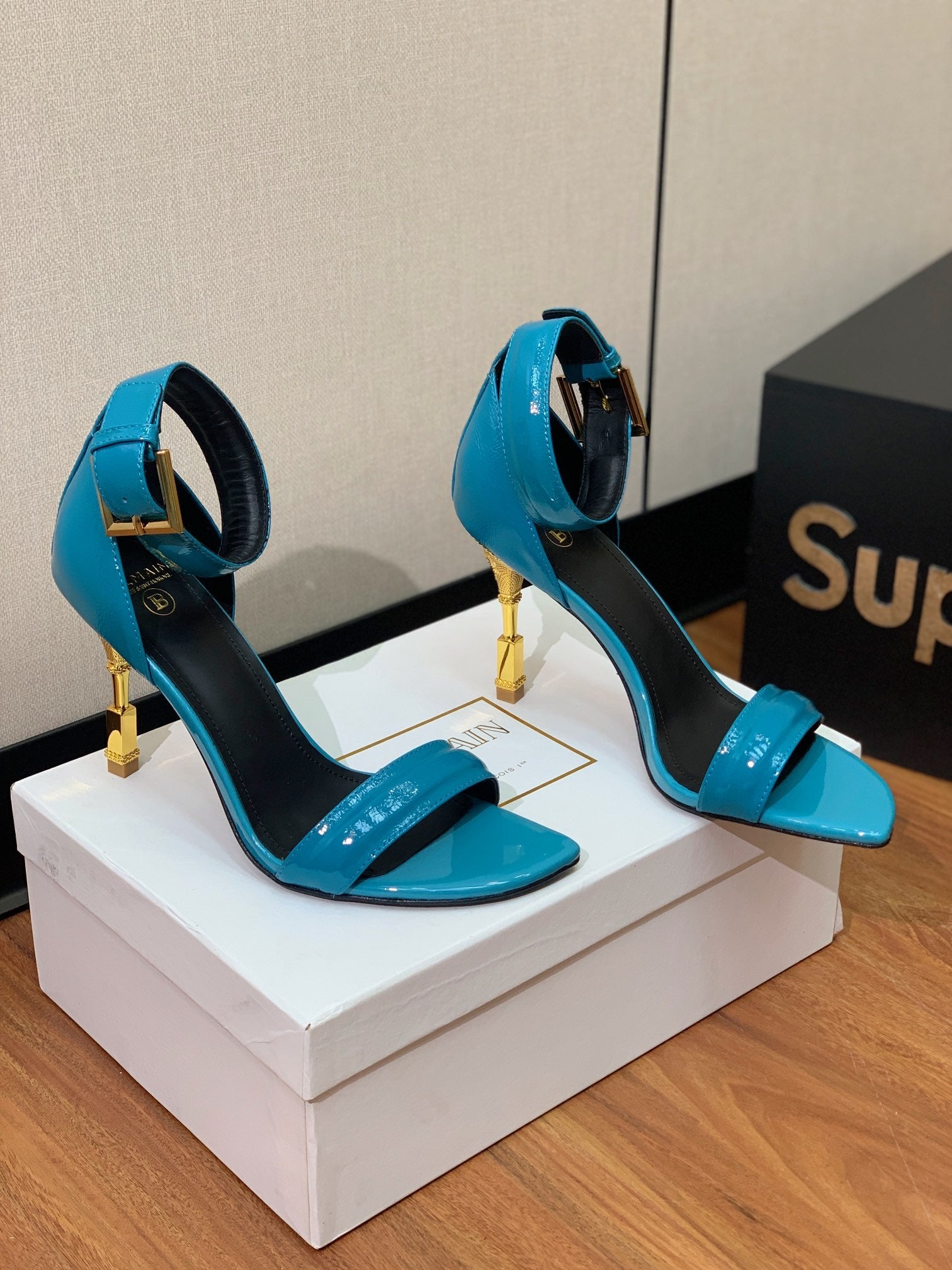 BALMAIN 26S METAL-HEEL SANDALS 105 MM IN CERULEAN BLUE CALFSKIN