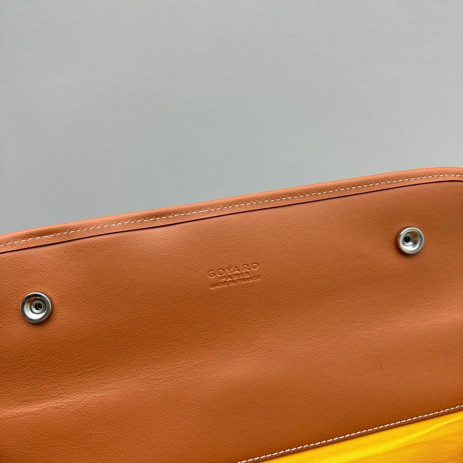 LEGER BACKPACK 37 IN BLACK GOYARDINE CANVAS WITH TAN CALFSKIN TRIM