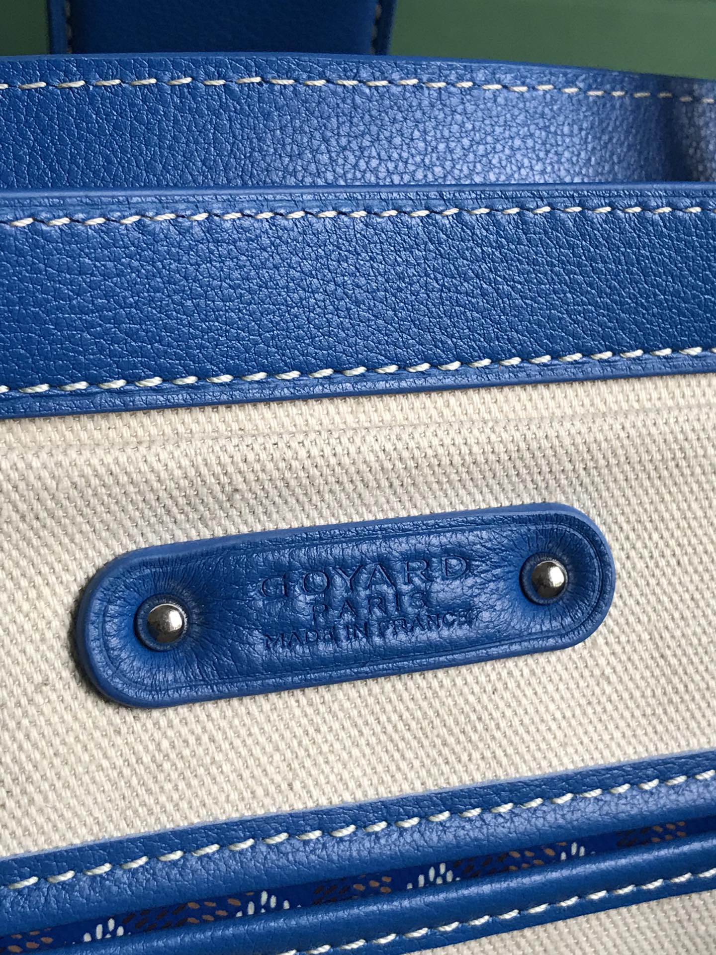 SAIGON SOUPLE BAG 34 IN CURIOUS BLUE GOYARDINE CANVAS AND CALFSKIN