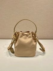 BUCKET BAG 19 IN BEIGE RE-NYLON AND SAFFIANO LEATHER HANDLE