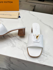 LV 26S CAPRI HIGH-HEELED MULES IN WHITE CALFSKIN