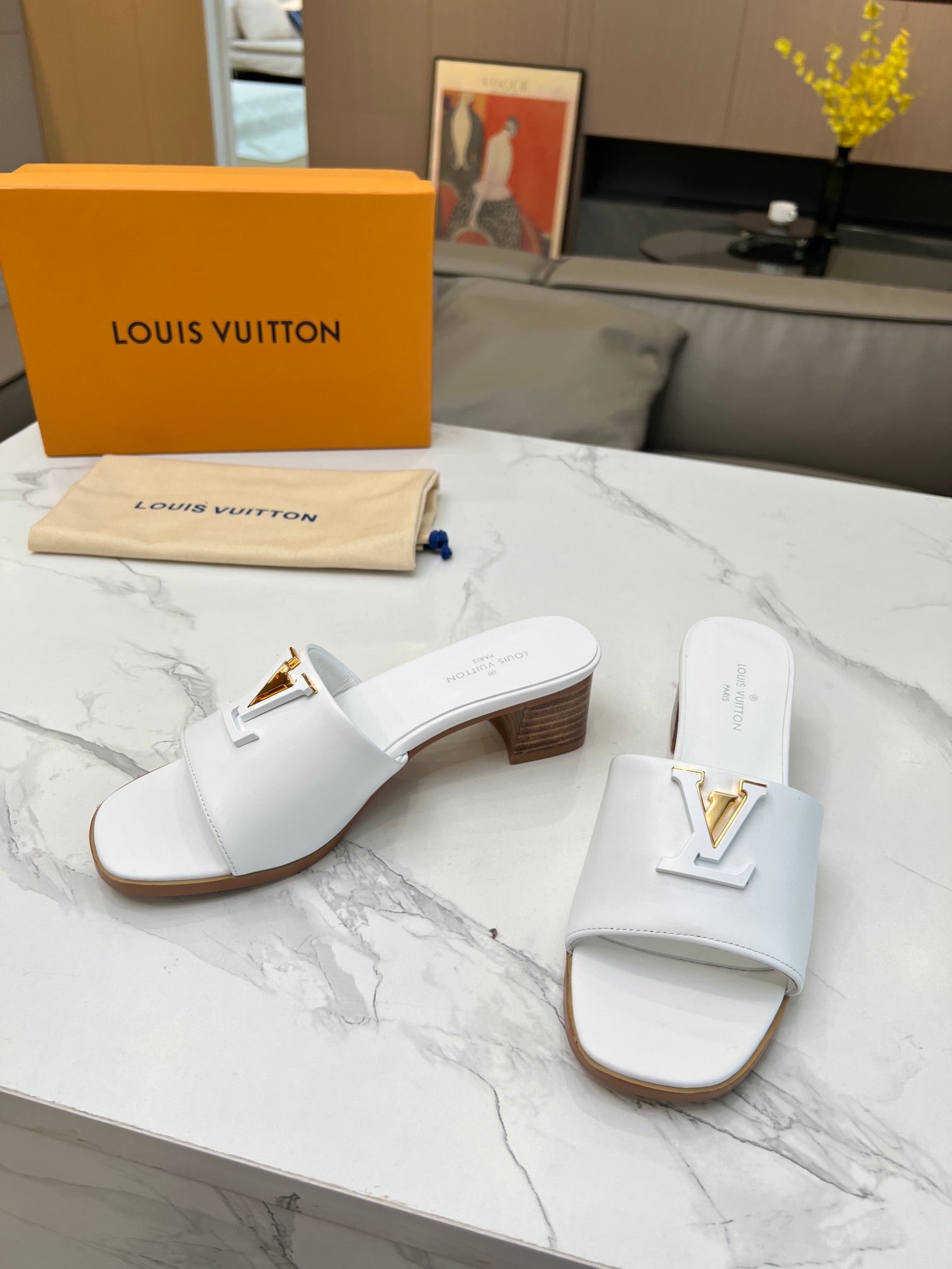 LV 26S CAPRI HIGH-HEELED MULES IN WHITE CALFSKIN