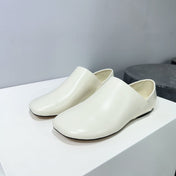 Toy slipper in white goatskin