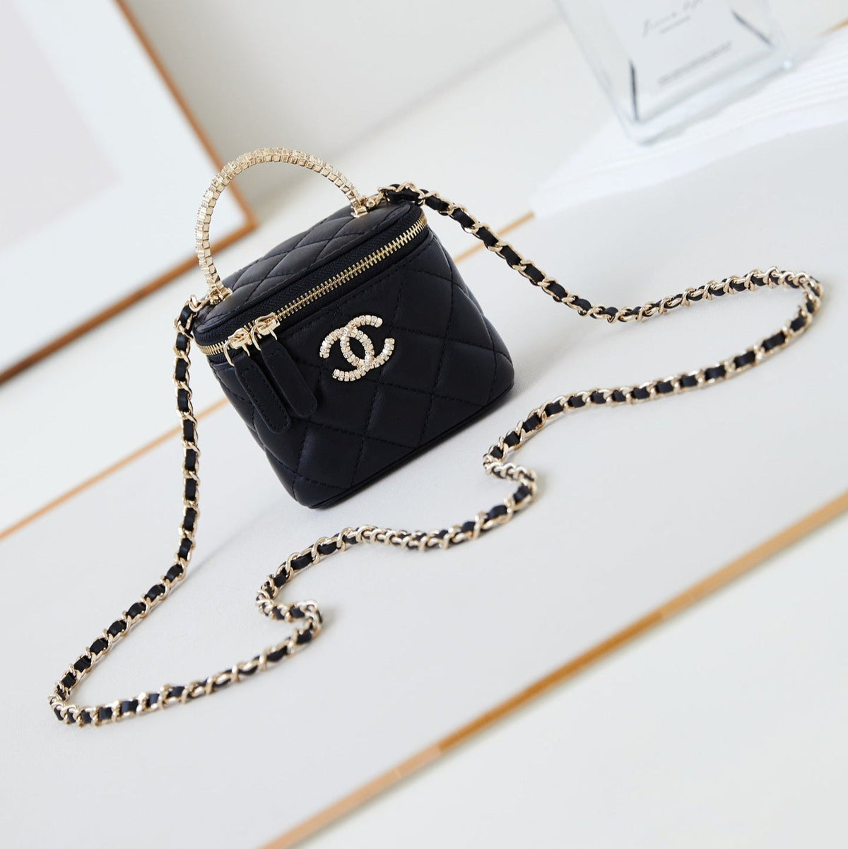 CHANEL 25S MINI VANITY BAG 11 CM IN BLACK LAMBSKIN WITH CRYSTAL-EMBELLISHED CC LOGO