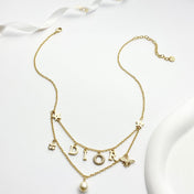CD 26S MULTI CHARM LAYERED DIOR NECKLACE WITH PEARL DROP IN GOLD TONE 631779
