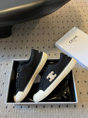 TRAINER LOW LACE-UP SNEAKER IN BLACK CANVAS