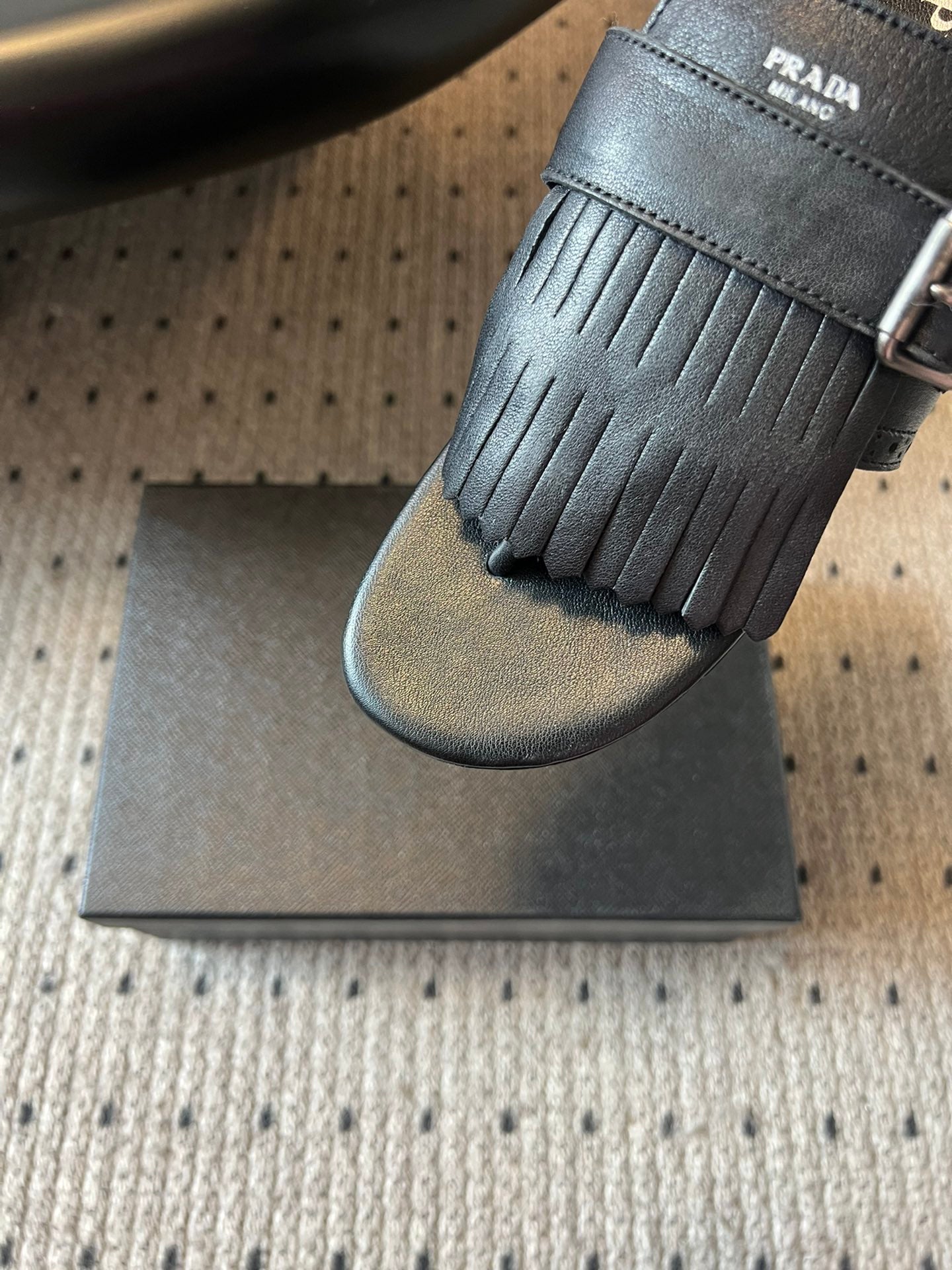 PRADA 25S SHUFFLE LEATHER THONG SANDALS IN BLACK CALFSKIN