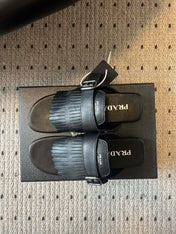 PRADA 25S SHUFFLE LEATHER THONG SANDALS IN BLACK CALFSKIN