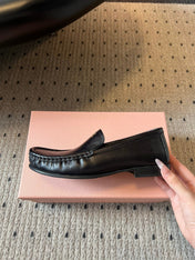 MIUMIU 26S LOAFERS IN BLACK CALFSKIN