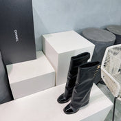 CHANEL HEELED KNEE-HIGH BOOTS 25S 85 MM IN BLACK LAMBSKIN WITH GOLD HARDWARE