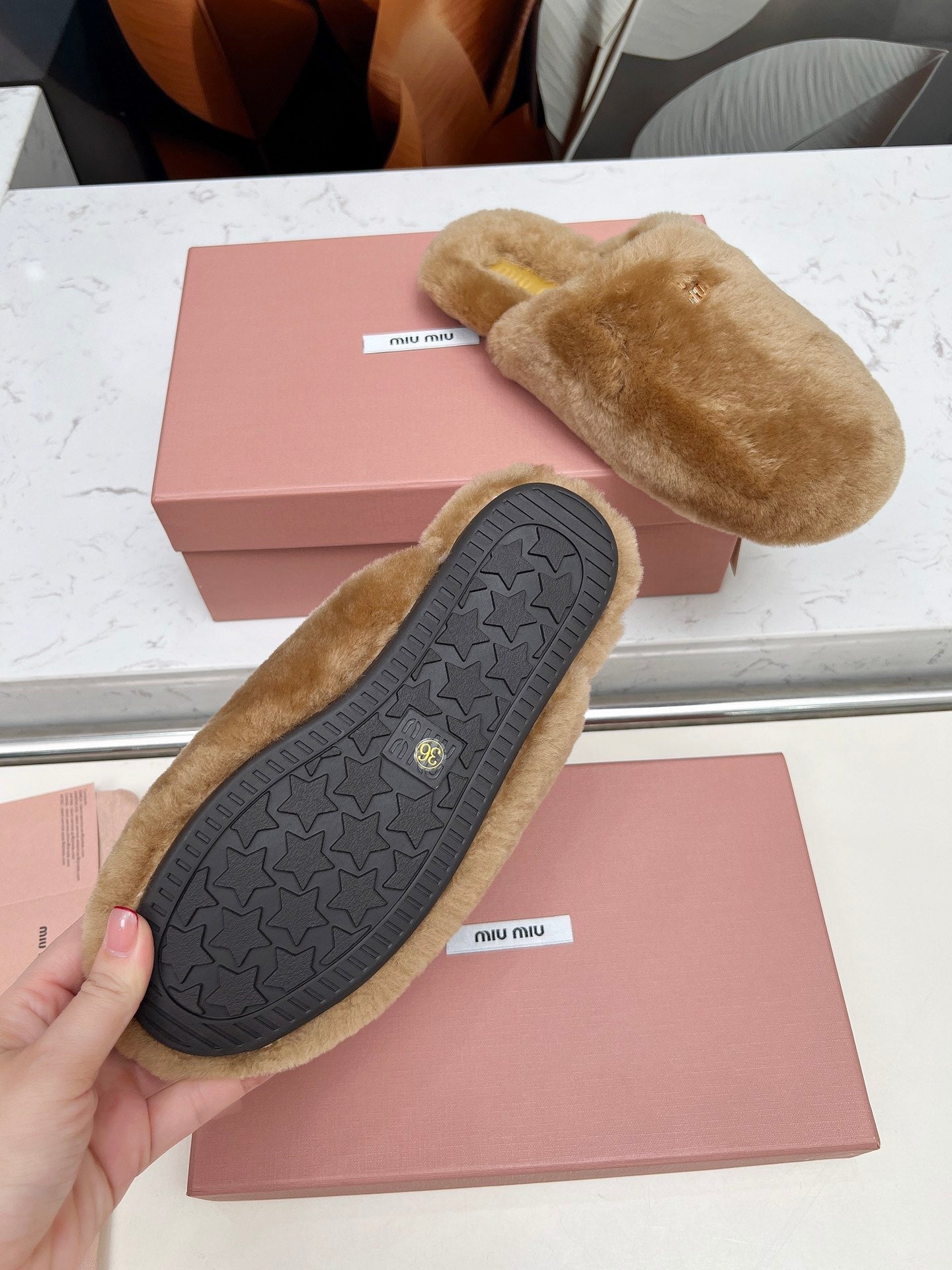 MIUMIU 26S MULES IN LIGHT BROWN SHEARLING 