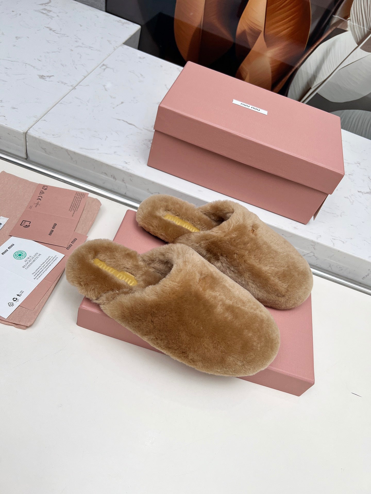 MIUMIU 26S MULES IN LIGHT BROWN SHEARLING 
