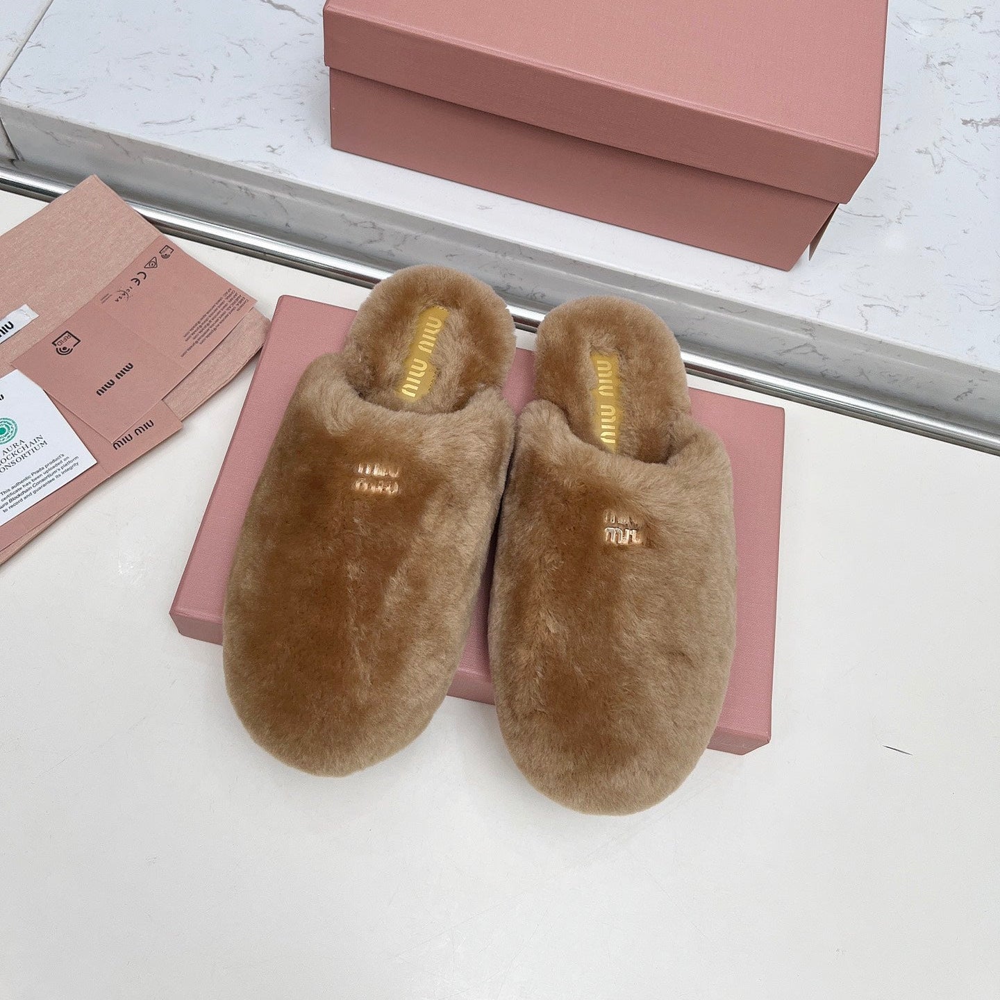MIUMIU 26S MULES IN LIGHT BROWN SHEARLING 