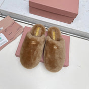 MIUMIU 26S MULES IN LIGHT BROWN SHEARLING 