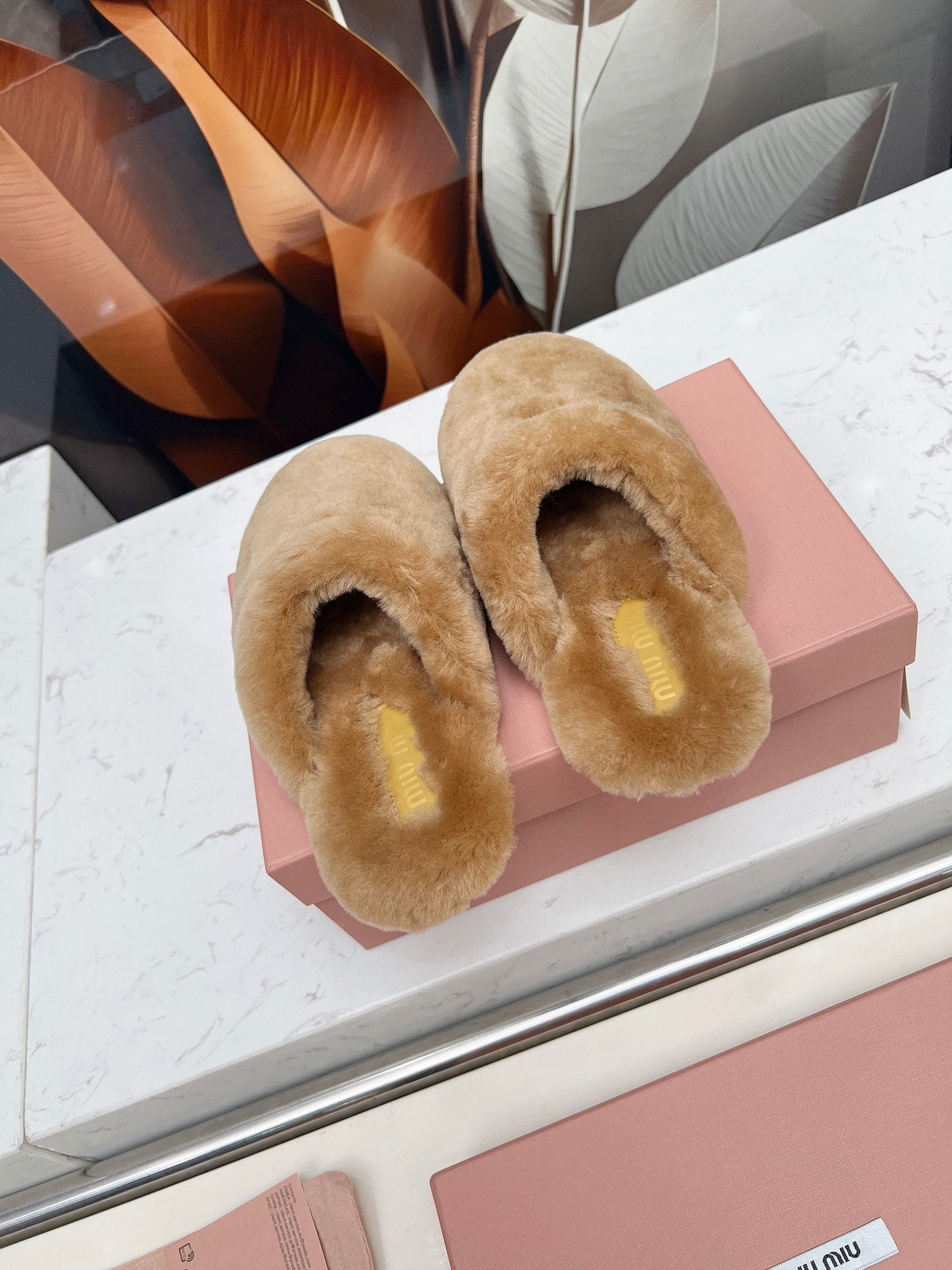 MIUMIU 26S MULES IN LIGHT BROWN SHEARLING 