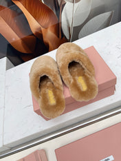 MIUMIU 26S MULES IN LIGHT BROWN SHEARLING 
