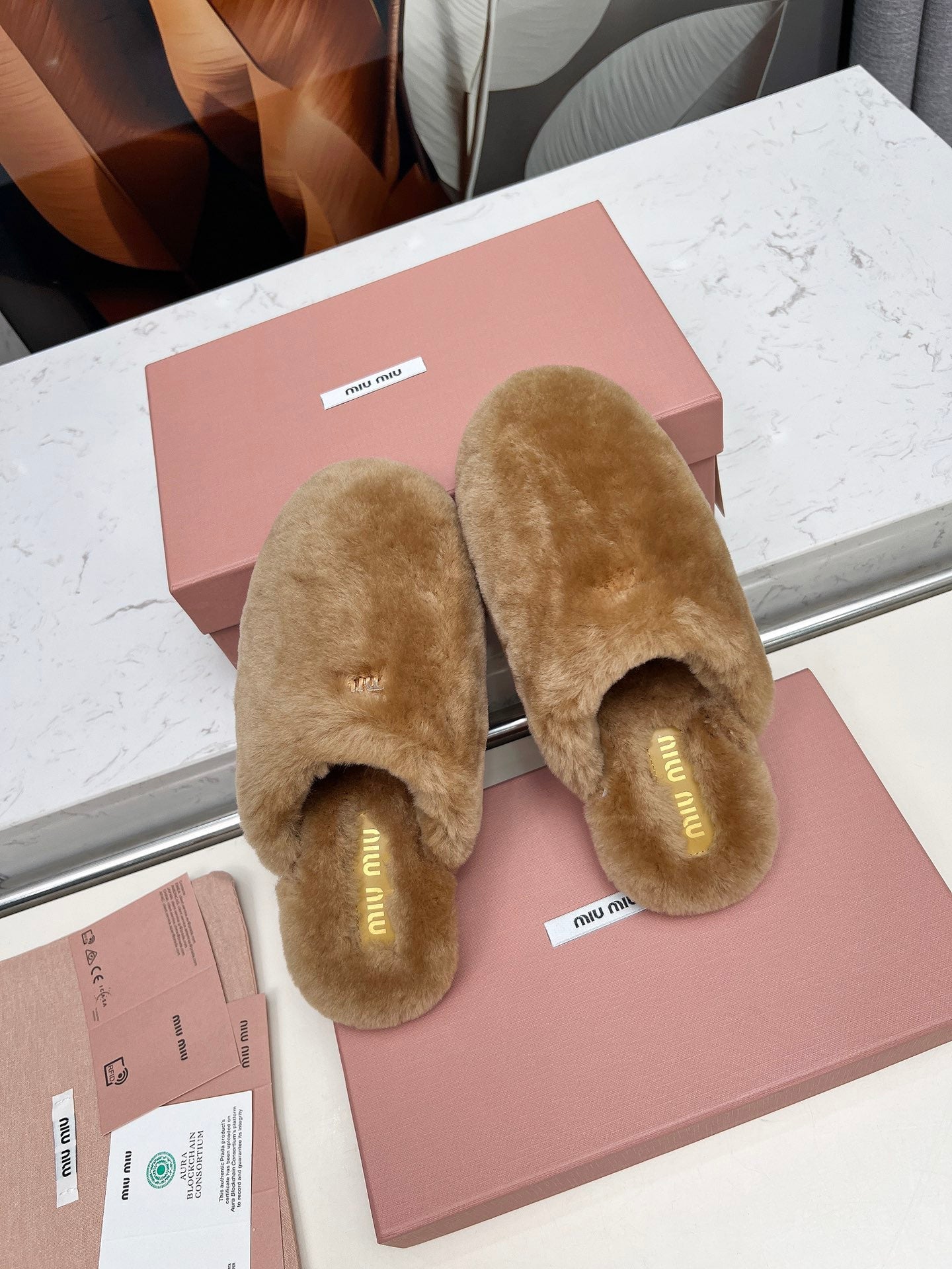 MIUMIU 26S MULES IN LIGHT BROWN SHEARLING 