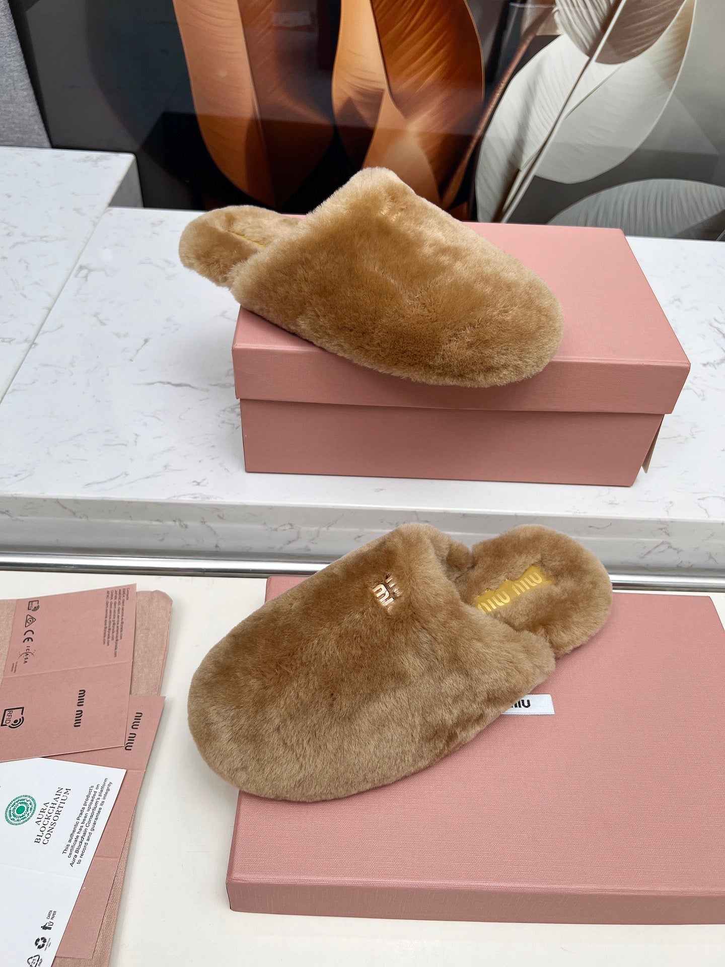 MIUMIU 26S MULES IN LIGHT BROWN SHEARLING 
