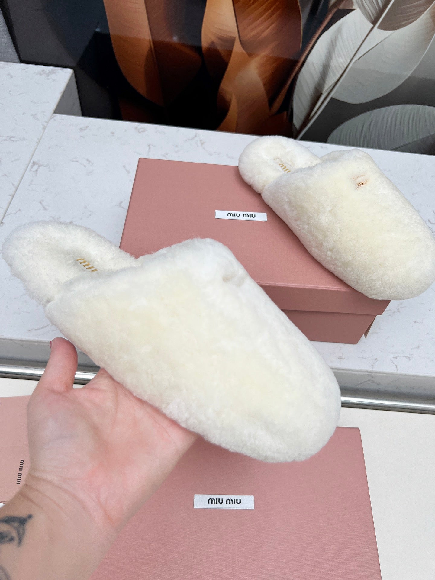 MIUMIU 26S MULES IN CREAM WHITE SHEARLING