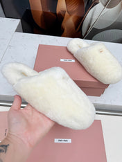 MIUMIU 26S MULES IN CREAM WHITE SHEARLING