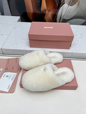 MIUMIU 26S MULES IN CREAM WHITE SHEARLING