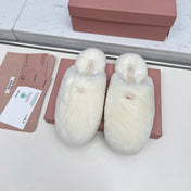 MIUMIU 26S MULES IN CREAM WHITE SHEARLING