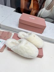 MIUMIU 26S MULES IN CREAM WHITE SHEARLING