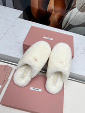 MIUMIU 26S MULES IN CREAM WHITE SHEARLING