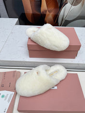 MIUMIU 26S MULES IN CREAM WHITE SHEARLING